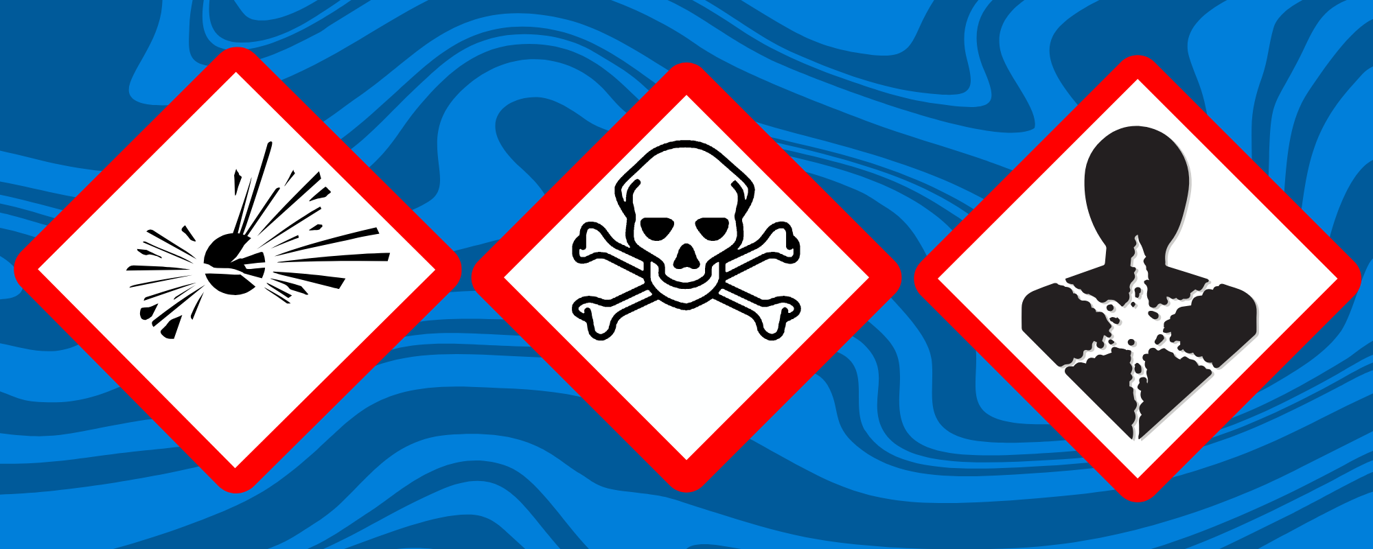 Verpackungen mit Gefahrensymbolen wie „explosiv“, „akut toxisch“ und „ernste Gesundheitsgefahr“